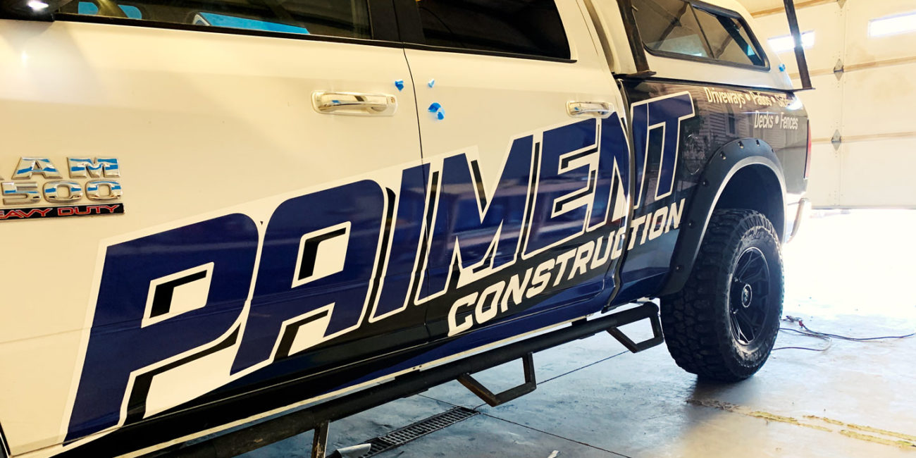 Paiment Construction partial truck wrap 1